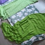 Soin rebozo réalisé par Mélissa, doula et accompagnante parentale, avec un tissu traditionnel pour envelopper et détendre une maman dans un moment de douceur